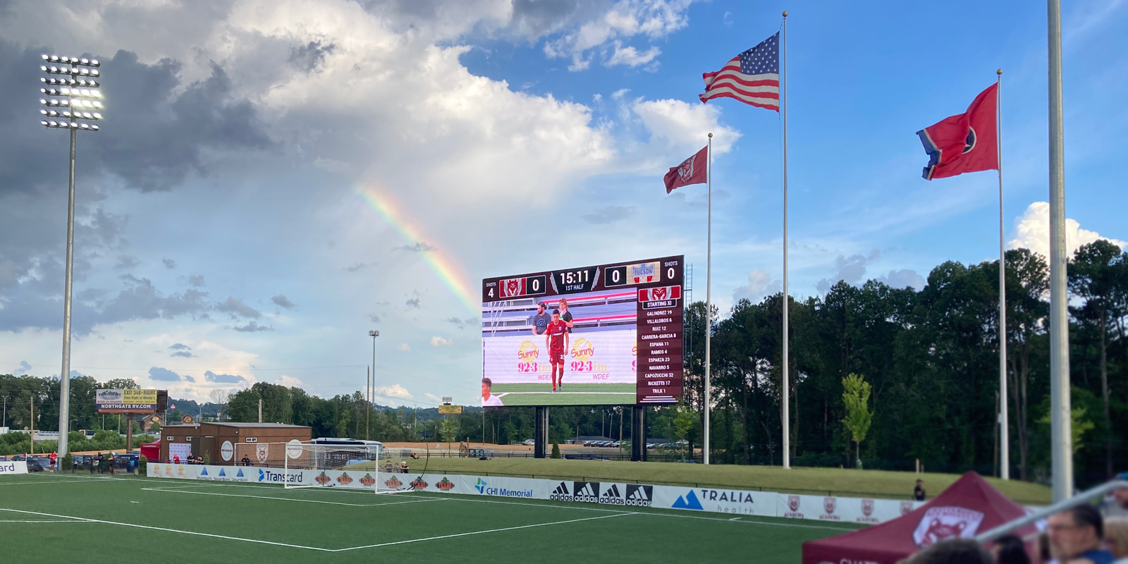 LED video scoreboard with live video of player